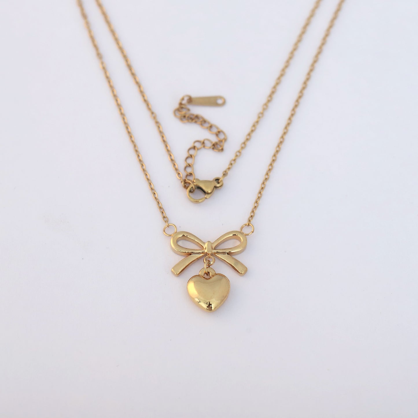 Elegant Bow & Heart Pendant Necklace - ZIPPORY