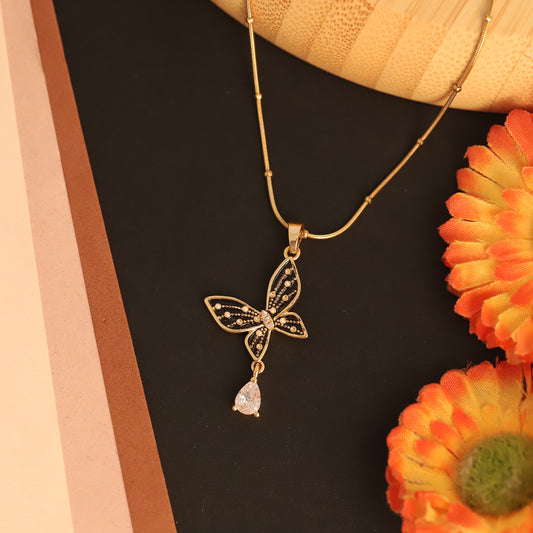 Twilight Wings Pendant Necklace – Black & Gold Butterfly with Teardrop Crystal - ZIPPORY