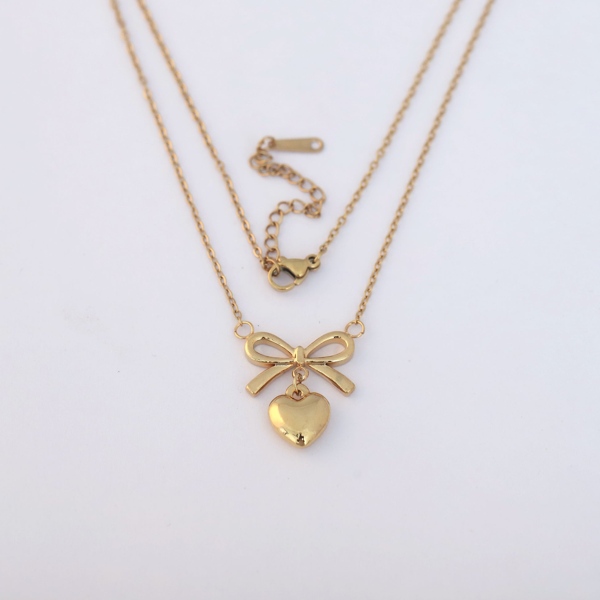 Elegant Bow & Heart Pendant Necklace - ZIPPORY