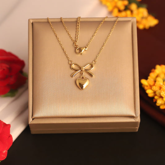 Elegant Bow & Heart Pendant Necklace - ZIPPORY