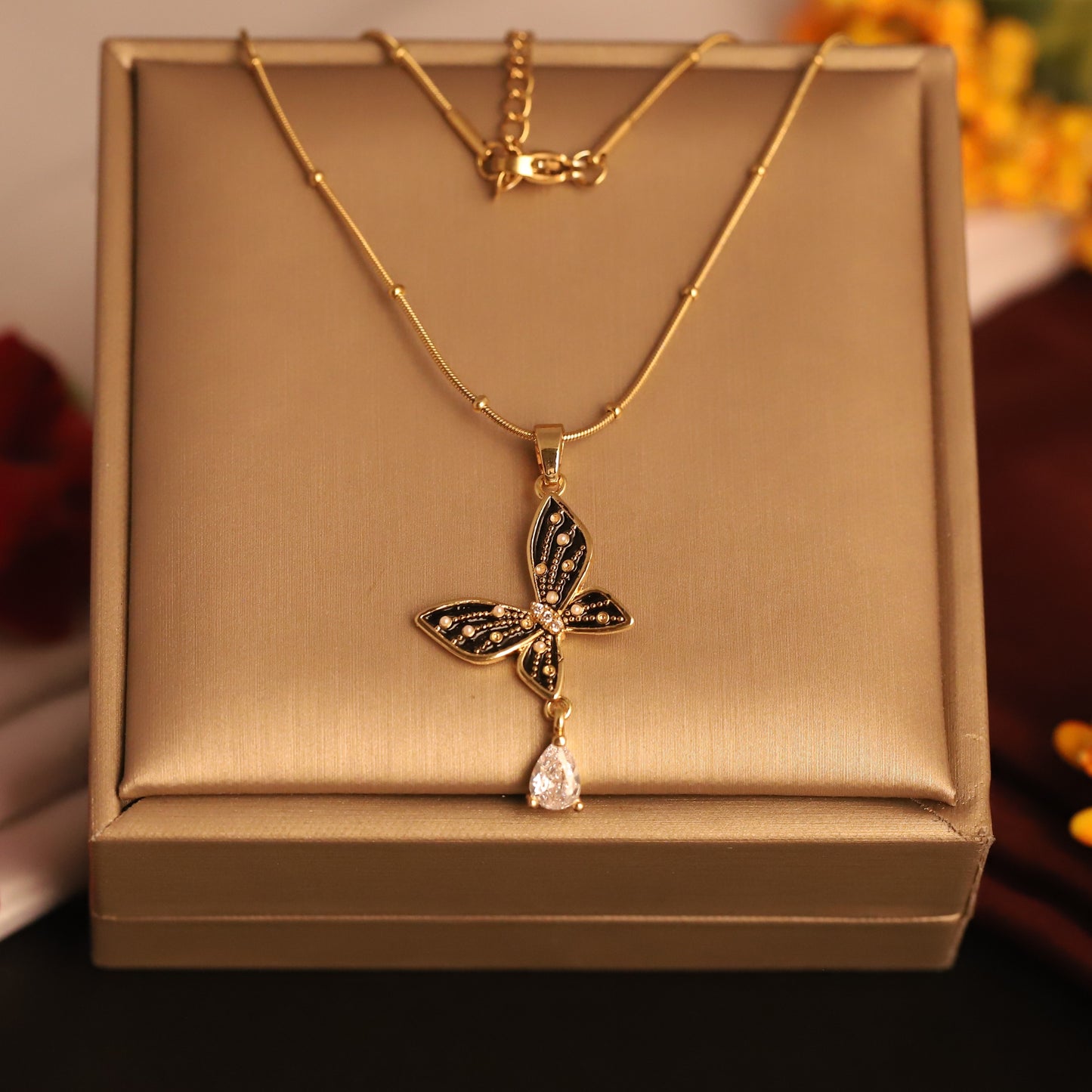Twilight Wings Pendant Necklace – Black & Gold Butterfly with Teardrop Crystal - ZIPPORY