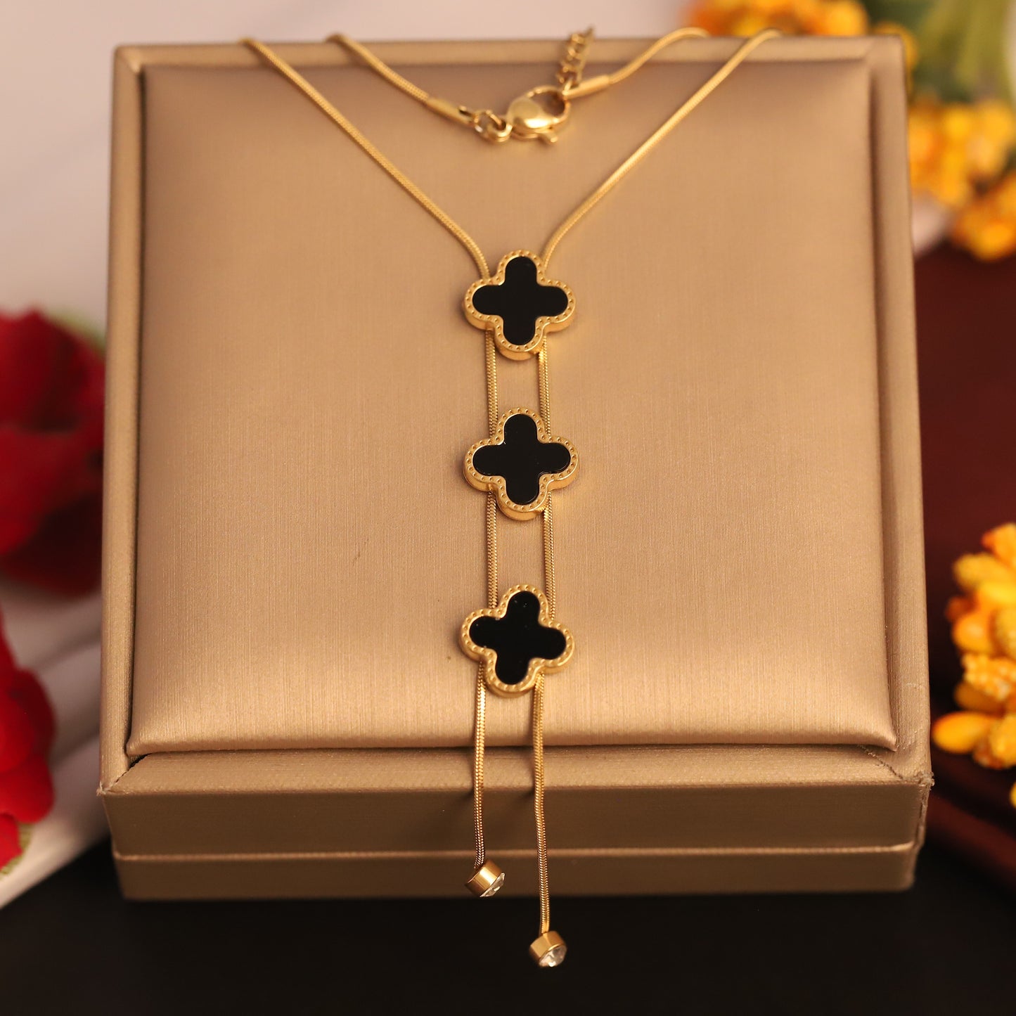 Noir Bloom Trinity Lariat – Gold-Plated Black Clover Necklace - ZIPPORY