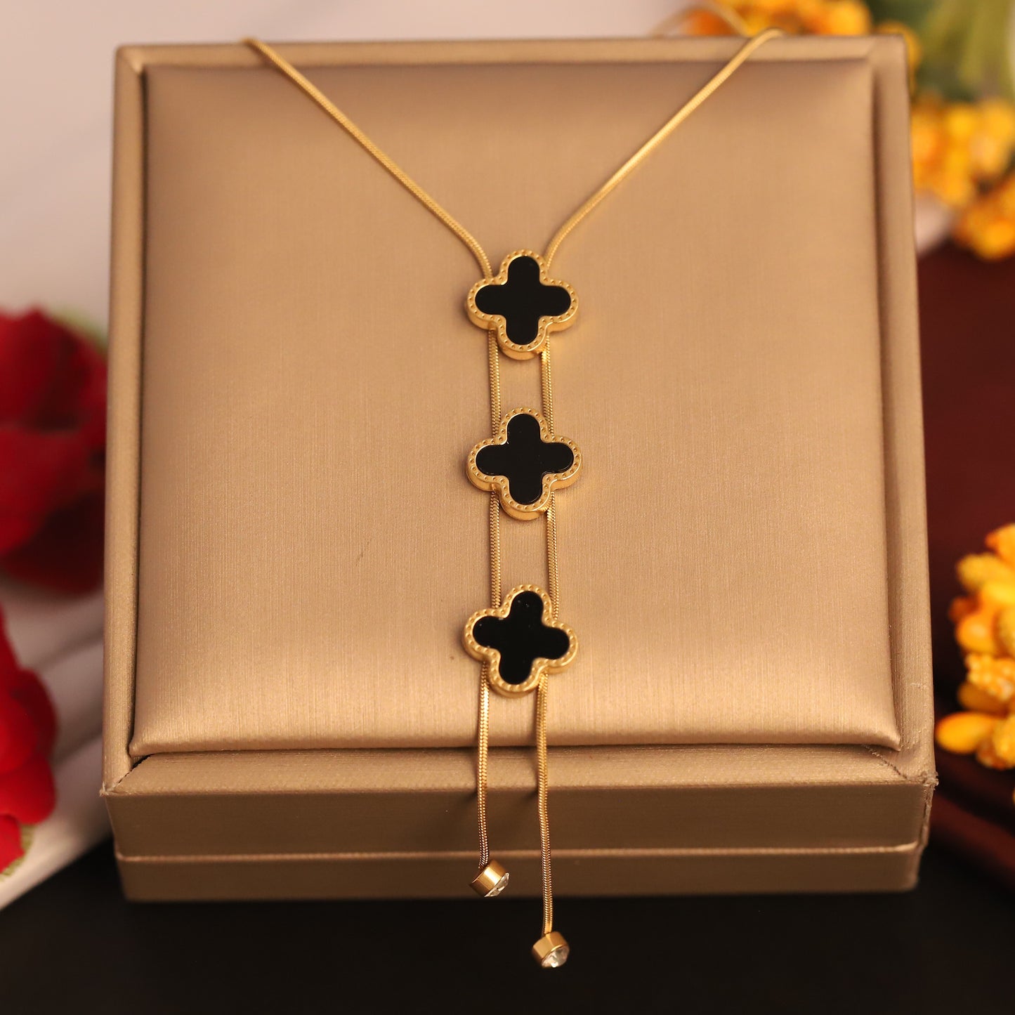 Noir Bloom Trinity Lariat – Gold-Plated Black Clover Necklace - ZIPPORY