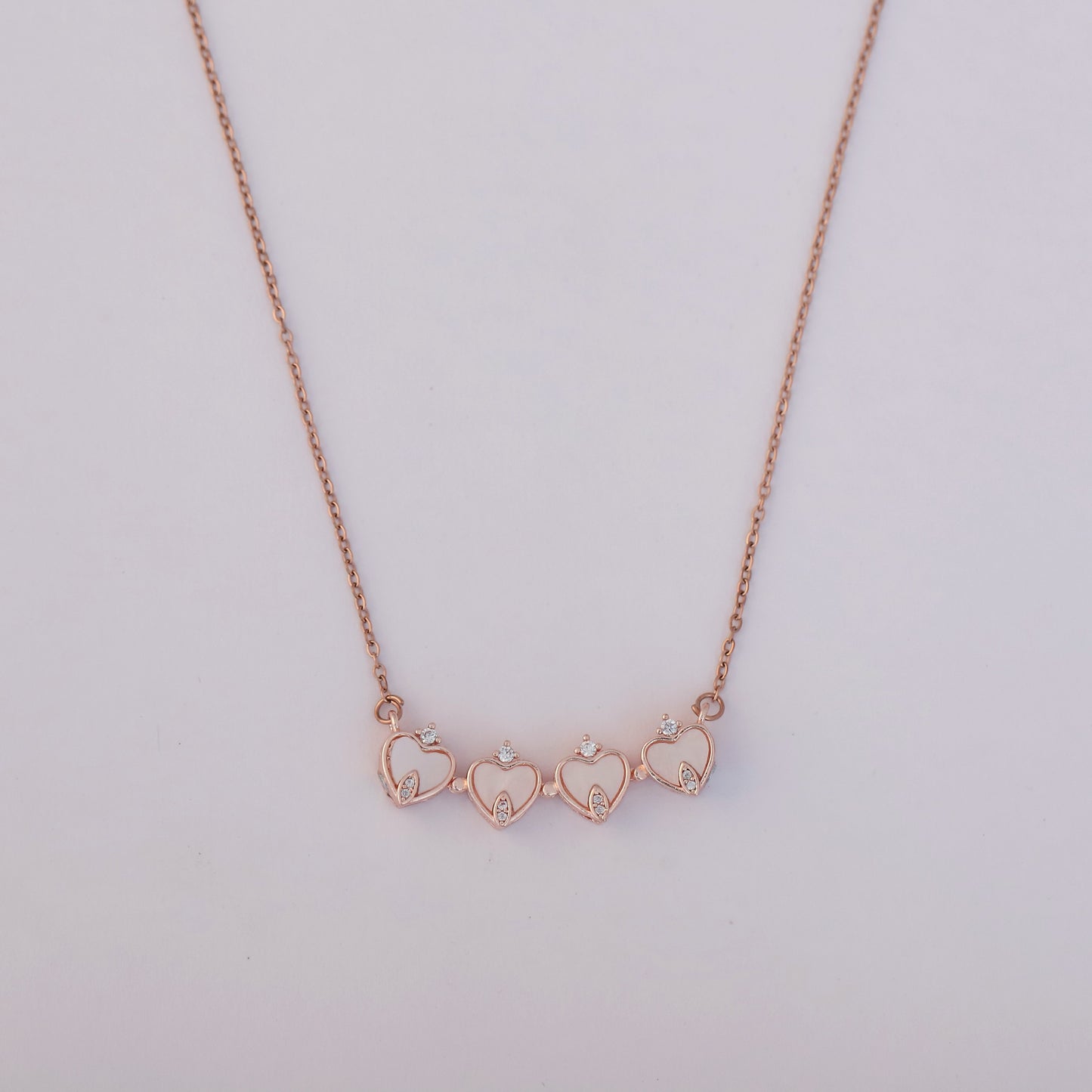 Rose Gold Plated Heart Shaped Magnetic Necklace with Crown Charms - ZIPPORY