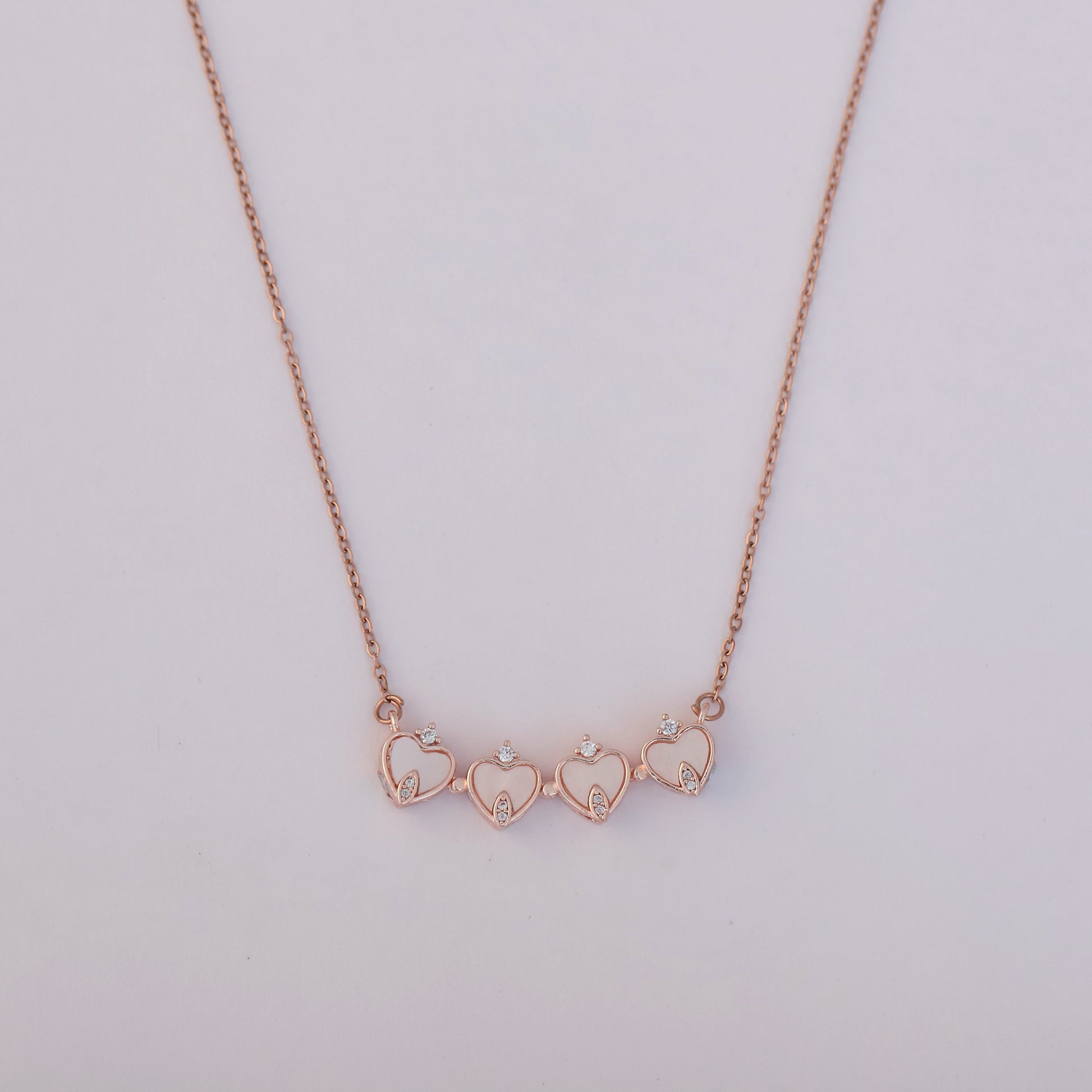 Rose Gold Plated Heart Shaped Magnetic Necklace with Crown Charms - ZIPPORY