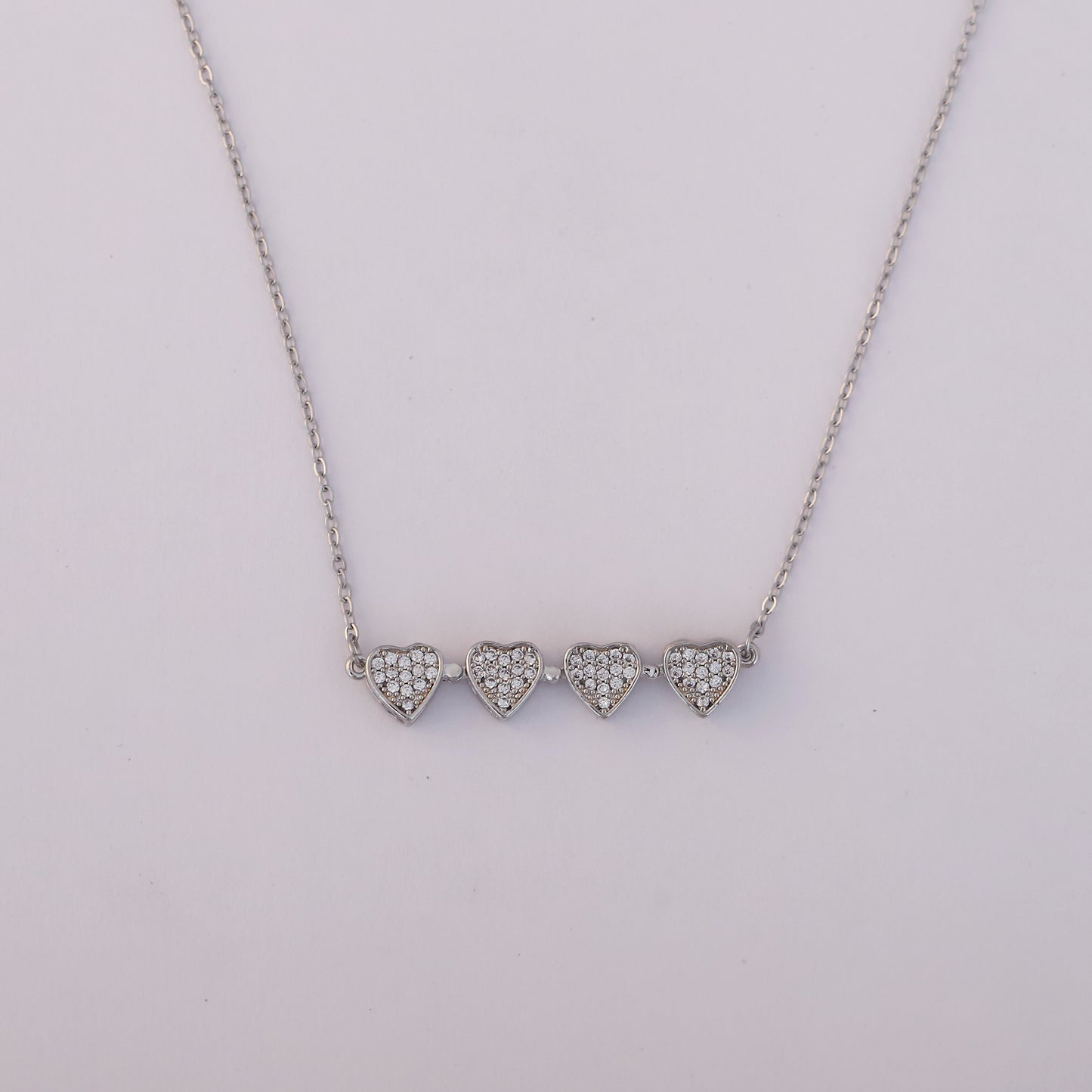 Sparkling Silver Plated Four Heart Pendant Necklace - ZIPPORY